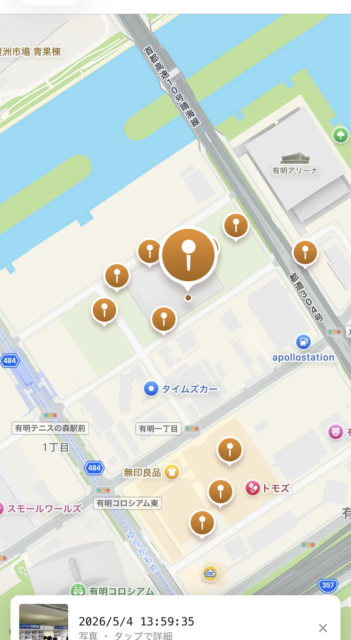 photobankモバイルアプリの地図画面。有明エリアに撮影地点のピンが複数表示されている